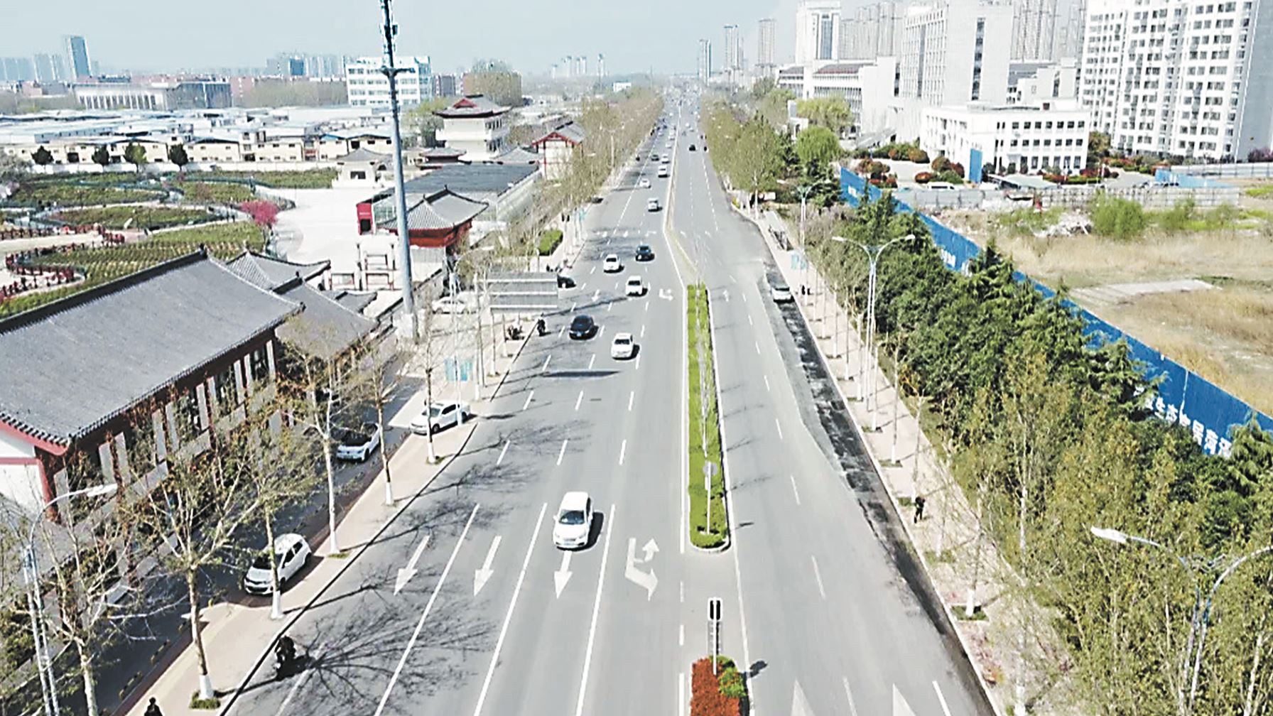 “截弯取直”畅通赏花路